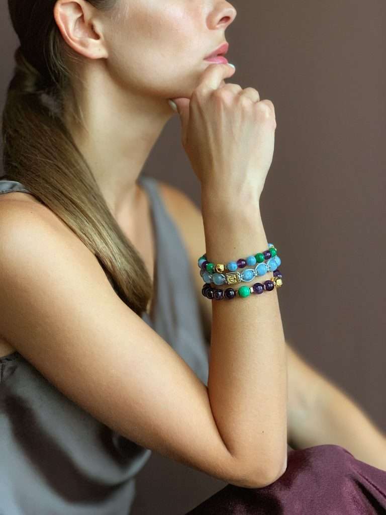 women wearing crystal bracelet