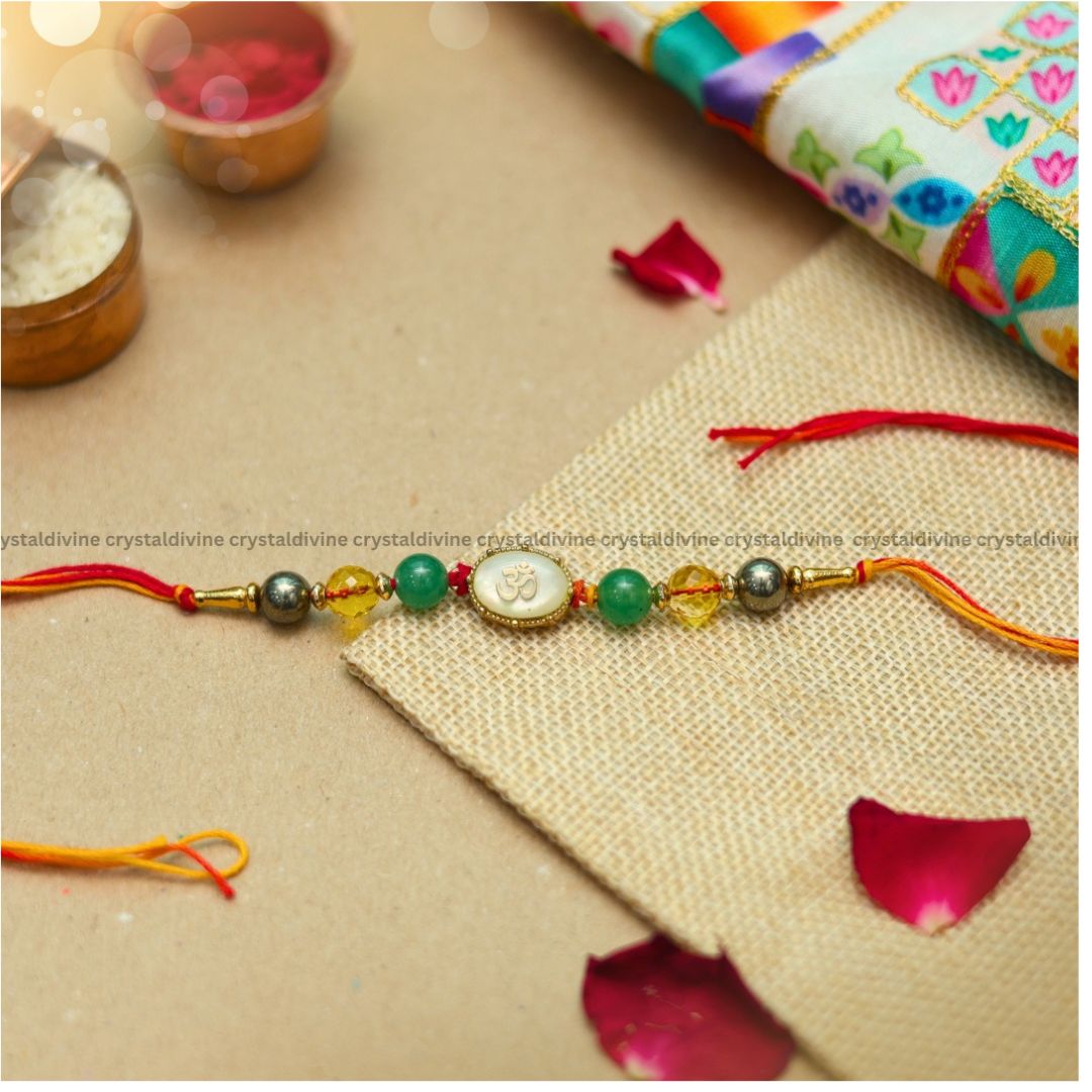 Om Symbol With Money Magnet Crystal Rakhi(Divine Blend of Prosperity, Protection)